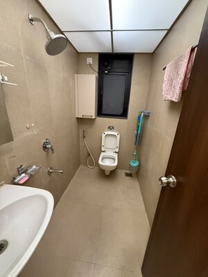Bathroom in 2 BHK Apartment at Runwal Eirene, Balkum Pada – for Rent