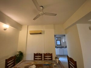 Living Room in 2.5 BHK Apartment at Tata Raheja Raisina Residency, Sector 59 – for Rent