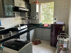 Kitchen in 2 BHK Apartment at Ajit Park CHS, Malad West – for Rent