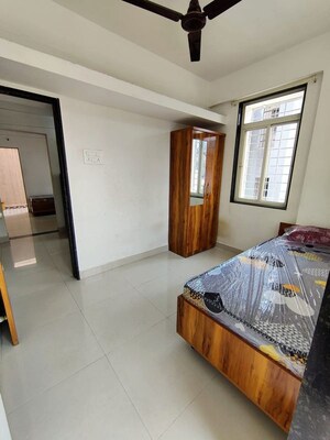 Bedroom in 1 BHK Apartment at Wadgaon Sheri – for Rent