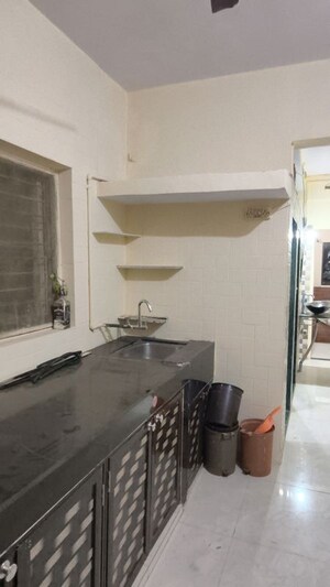 Kitchen in 1 BHK Apartment at Naupada – for Sale