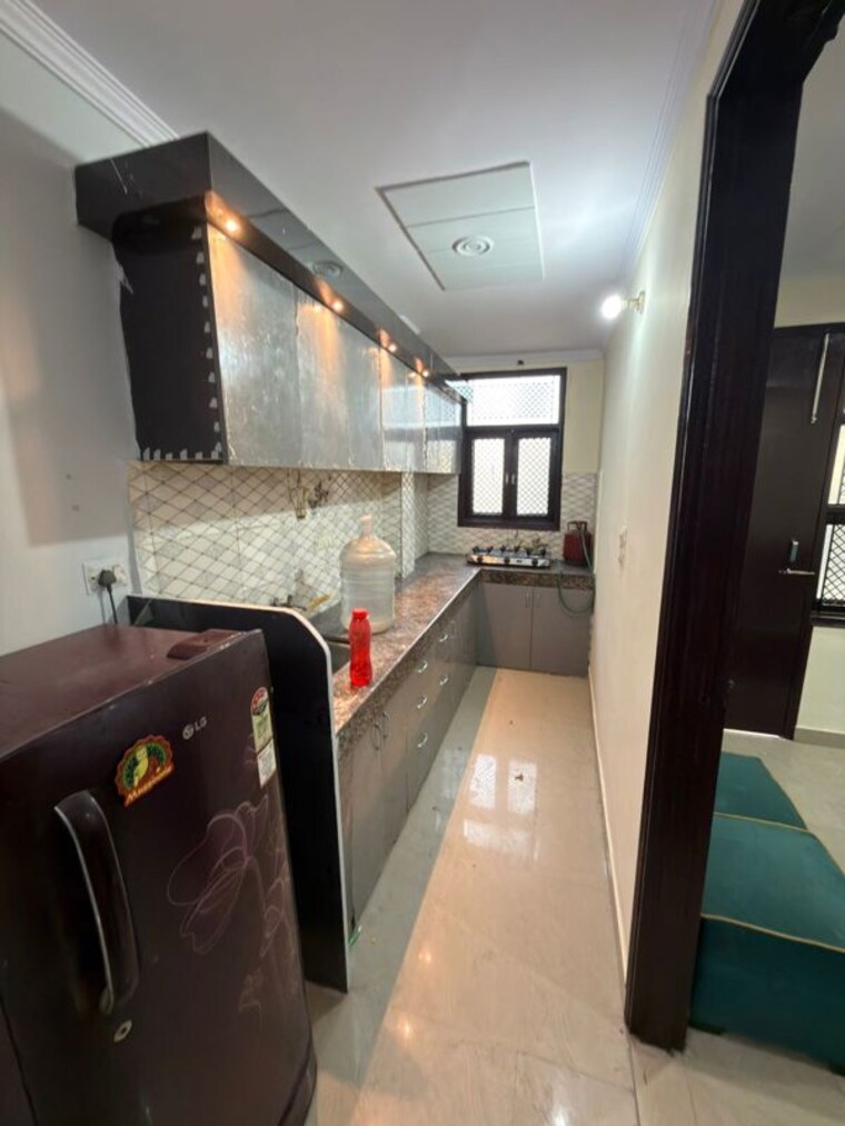 Kitchen, dwarka mor 2 Bedroom 60 Sq.Yd. Builder Floor In Dwarka Mor Delhi 10476831