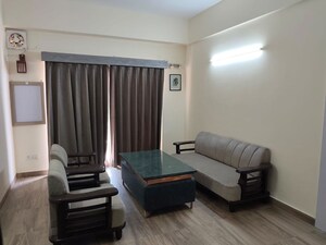 Living Room in 1 BHK Apartment at Paramount Golf Forest Studio Apartments - OAK Towe, Zeta I Greater Noida – for Rent