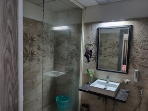 Bathroom in 1 BHK Apartment at Paramount Golf Forest Studio Apartments - OAK Towe, Zeta I Greater Noida – for Rent