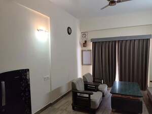 Living Room in 1 BHK Apartment at Paramount Golf Forest Studio Apartments - OAK Towe, Zeta I Greater Noida – for Rent