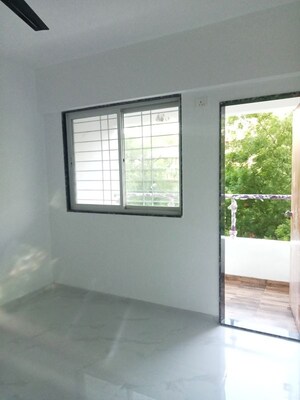 Room in 2 BHK Apartment at Nirman Aura, Ambegaon Budruk – for Rent