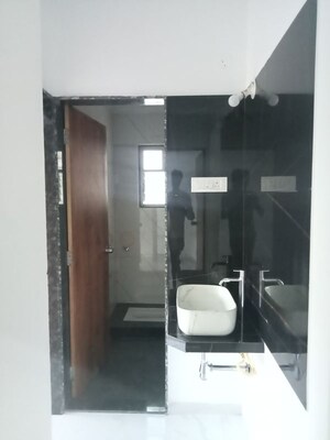Bathroom in 2 BHK Apartment at Nirman Aura, Ambegaon Budruk – for Rent
