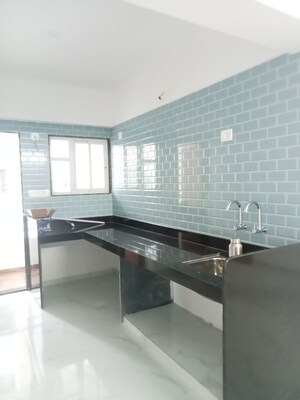 Kitchen in 2 BHK Apartment at Nirman Aura, Ambegaon Budruk – for Rent