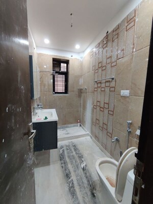 Bathroom in 4 BHK Builder Floor at Green Fields Colony – for Rent