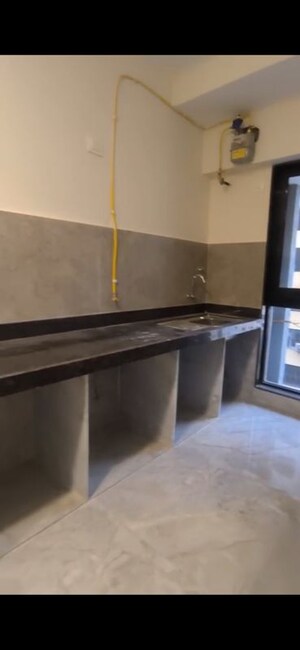Kitchen in 1 BHK Apartment at Ajmera Boulevard, Malad West – for Sale