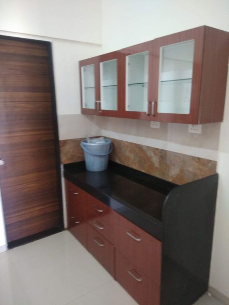 Kitchen, aple-ghar 2 Bedroom 850 Sq.Ft. Apartment In Kharadi Pune 10477475