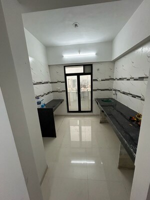 Building Lobby in 1 BHK Apartment at Dynamic Crest, Shilphata – for Rent