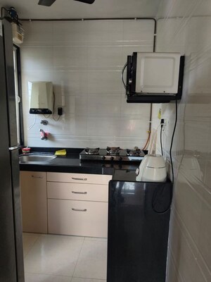 Kitchen in 1 BHK Apartment at Ek Siddhi CHS Kolbad Road, Khopat – for Sale