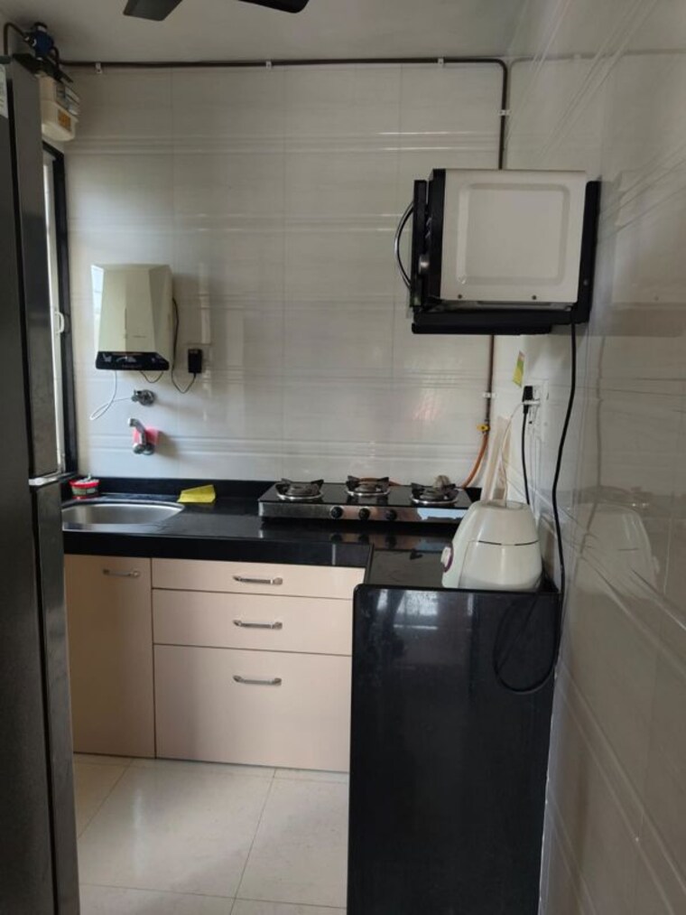Kitchen, ek-siddhi-chs-kolbad-road 1 Bedroom 550 Sq.Ft. Apartment In Khopat Thane 10477582
