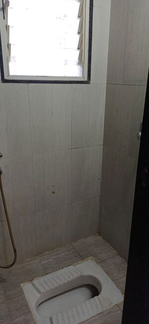 Bathroom in 1 BHK Apartment at Satyam Rajyog, Dhanori – for Rent