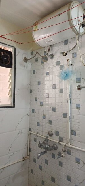Bathroom in 1 BHK Apartment at Satyam Rajyog, Dhanori – for Rent