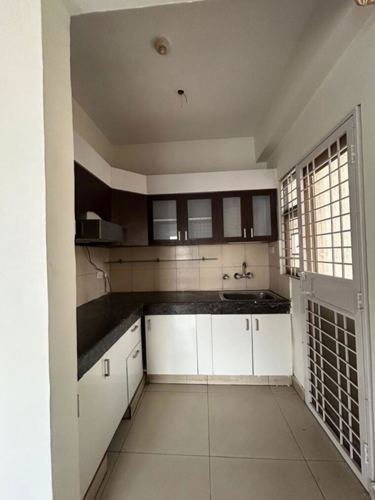 Kitchen, supertech-eco-village-ii 3 Bedroom 1440 Sq.Ft. Apartment In Sector 16b Greater Noida Greater Noida 10477703