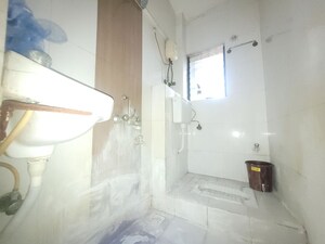 Bathroom in 1 BHK Apartment at Raunak Unnathi Woods, Ghodbunder Road – for Rent