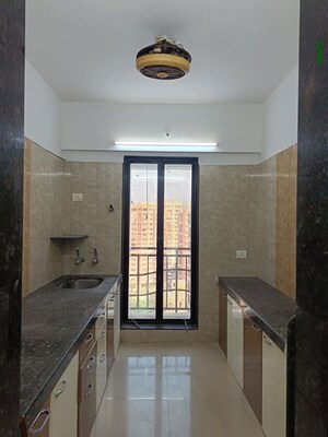 Kitchen in 3 BHK Apartment at Leena Bhairav Residency, Mira Road – for Sale