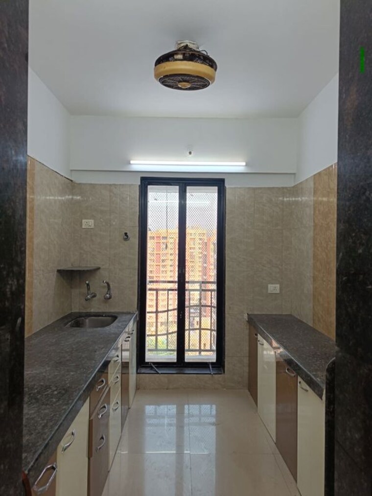 Kitchen, leena-bhairav-residency 3 Bedroom 1340 Sq.Ft. Apartment In Mira Road Thane 10477786