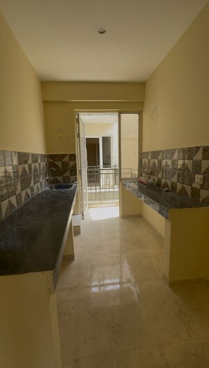 Kitchen in 3 BHK Apartment at ROF Aalayas Phase 2, Sector 102 – for Sale
