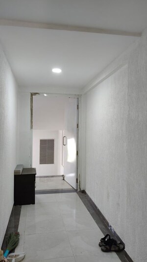 Building Lobby in 1 BHK Apartment at Wadgaon Sheri – for Rent
