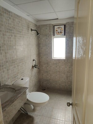 Bathroom in 2.5 BHK Apartment at Paras Tierea Premium Floor, Sector 137 – for Sale