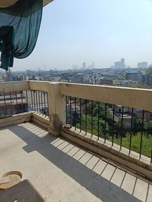 Balcony in 3.5 BHK Apartment at Vasundhara Enclave – for Rent