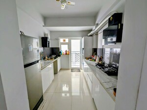 Kitchen in 3.5 BHK Builder Floor at Central Park Flower Valley Aqua Front Towers, Sohna Sector 33 – for Rent