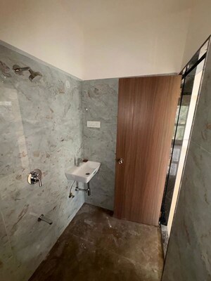 Bathroom in 3 BHK Apartment at Sadhana Bliss, Malad West – for Rent