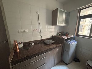 Kitchen in 1.5 BHK Apartment at Chandiwala Pearl Heaven, Andheri East – for Rent
