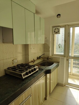 Kitchen in 2.5 BHK Apartment at Paras Tierea Premium Floor, Sector 137 – for Rent