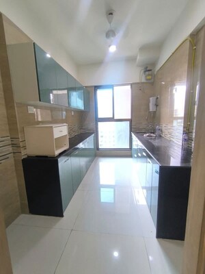 Kitchen in 2 BHK Apartment at Raj Infinia, Malad West – for Rent