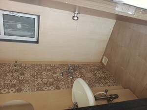 Bathroom in 1 BHK Apartment at JP North Barcelona, Mira Road – for Rent