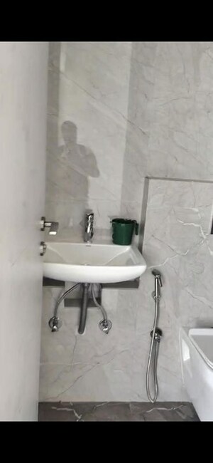 Bathroom in 2 BHK Apartment at Ruparel Sky Green, Kandivali West – for Rent