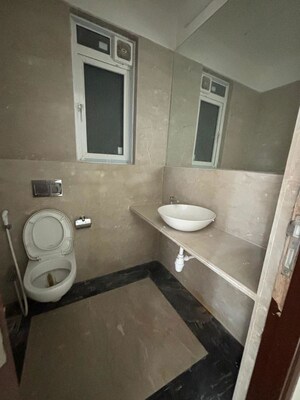 Bathroom in 4 BHK Apartment at Omkar Alta Monte, Malad East – for Rent