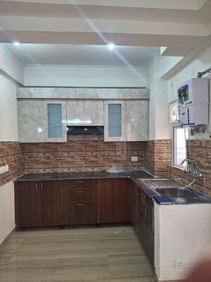 Kitchen in 2 BHK Apartment at Hawelia Valencia Homes, Sector 1 Greater Noida – for Rent