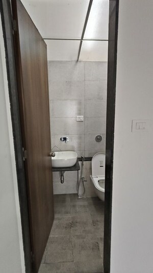 Bathroom in 2.5 BHK Apartment at Wadgaon Sheri – for Rent