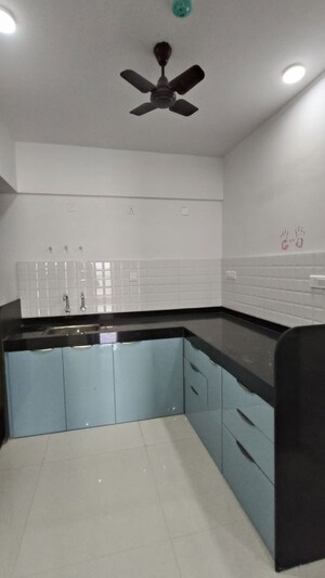 Kitchen in 2.5 BHK Apartment at Wadgaon Sheri – for Rent