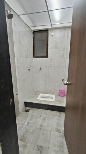Bathroom in 2.5 BHK Apartment at Wadgaon Sheri – for Rent