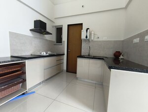 Kitchen in 2 BHK Apartment at Gera Planet Of Joy, Kharadi – for Rent