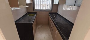 Kitchen in 2 BHK Apartment at Rustomjee Cleon, Bandra East – for Rent