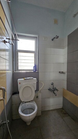 Bathroom in 3 BHK Apartment at Prahlad Nagar – for Rent