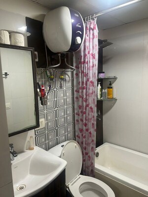 Bathroom in 3 BHK Apartment at Amrapali Silicon City, Sector 76 – for Rent
