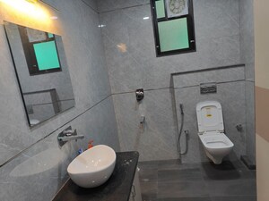 Bathroom in 3 BHK Builder Floor at Mansarovar Extension – for Rent
