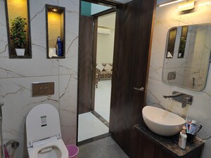 Bathroom in 3 BHK Builder Floor at Mansarovar Extension – for Rent