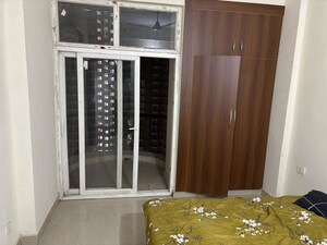 Bedroom in 2 BHK Apartment at Aims Golf City, Sector 75 – for Rent