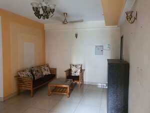 Living Room in 2 BHK Apartment at Aims Golf City, Sector 75 – for Rent