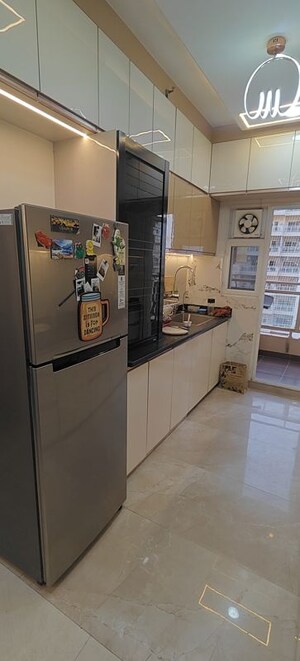Kitchen in 2 BHK Apartment at Aims Golf City, Sector 75 – for Rent