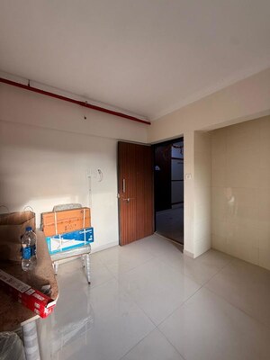 Living Room in 1 BHK Apartment at Raunak Bliss B1, Ghodbunder Road – for Rent